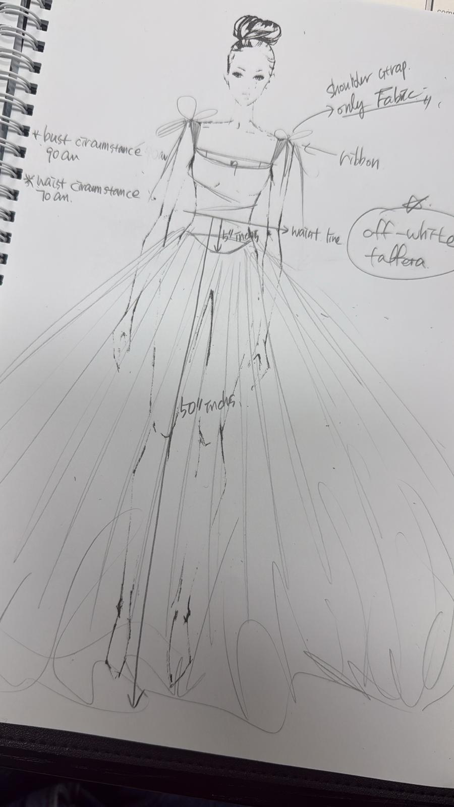 Client-provided WhatsApp sketch for Mina's white taffeta ballgown, showing shoulder bow straps, waistline note, and full skirt direction