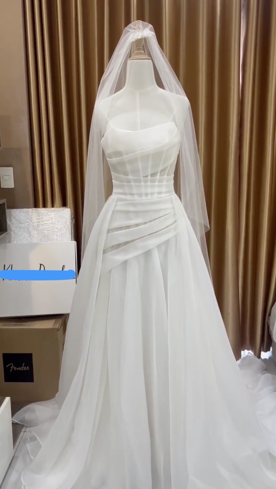 Final front QC of Klara's premium chiffon A-line wedding dress with bespoke neckline, draped bodice, and shimmer layer before Australia delivery